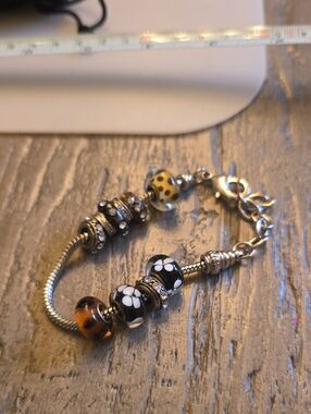 Pandora Style Silver Charm Bracelet with Black, Brown and Yellow Glass Beads